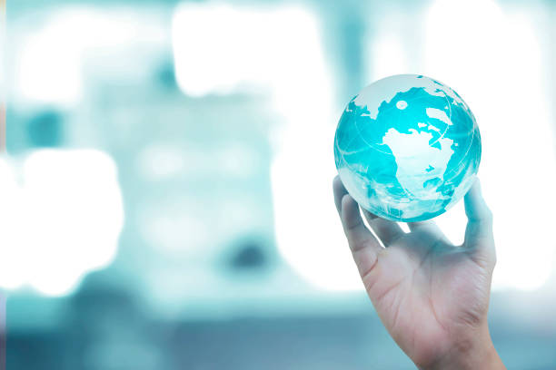 istock Globe ,earth in hand, holding our planet  glowing. Earth image provided by Nasa 1169588211