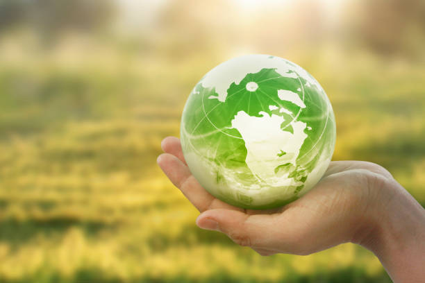 istock Globe ,earth in hand, holding our planet  glowing. Earth image provided by Nasa 1169588212