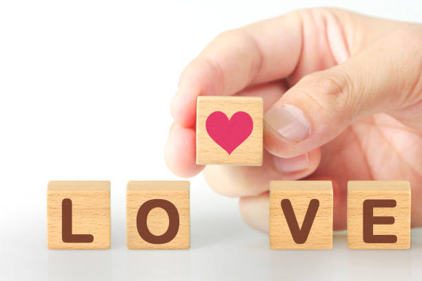 istock Concept creative idea and innovation.  wooden cube block  in hand 1169588260