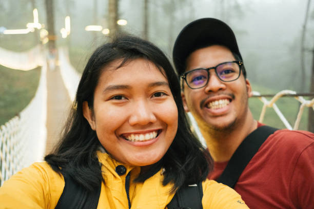 istock Young Couple Selfie Together while Travelling in Bandung 1169591870