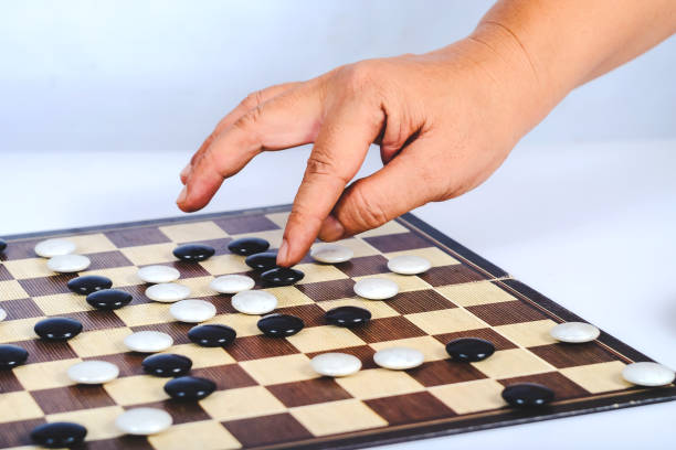 istock Board game Go and black and white bones. Go or wei-Chi ,asian board game. 1169593714