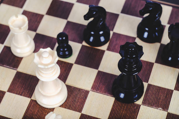 istock chess figure on board game concept for competition and strategy. 1169593724