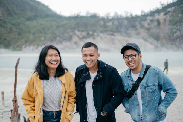 istock Group of Friends Taking Photo Together while Travelling 1169596011