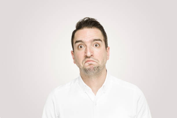 istock Mid adult man showing that he doesn't know 1169596037