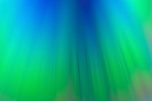 Neon rainbow streaks, blurred multicolor beams. Abstract background