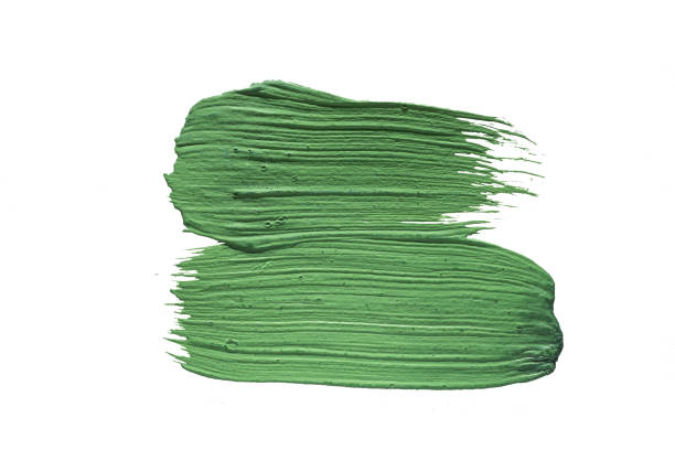 istock green oil paint spot isolated on white background 1169599201