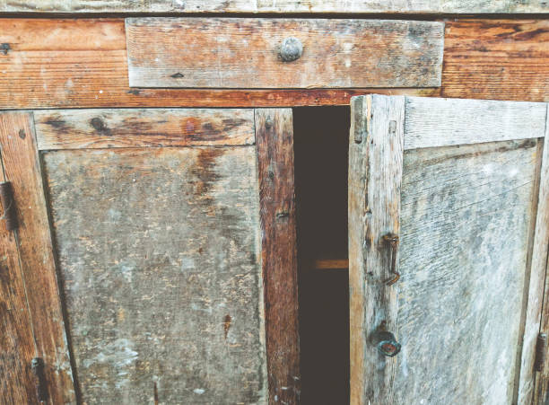 Very old vintage and battered wooden cupboard