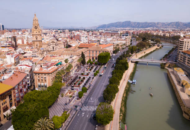 Aerial view of Murcia cityscape Aerial panoramic view of Murcia cityscape with bell tower of Cathedral Church of Saint Mary, Spain murcia stock pictures, royalty-free photos & images