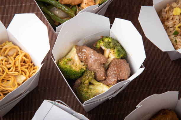 istock broccoli beef in traditional american chinese box 1169604080
