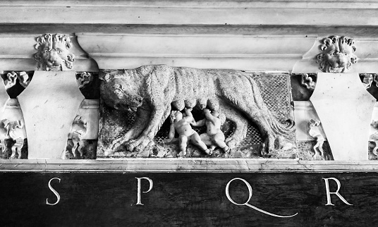 Sculpture of the mythical she-wolf suckling the infant twins Romulus and Remus. Rome, Italy