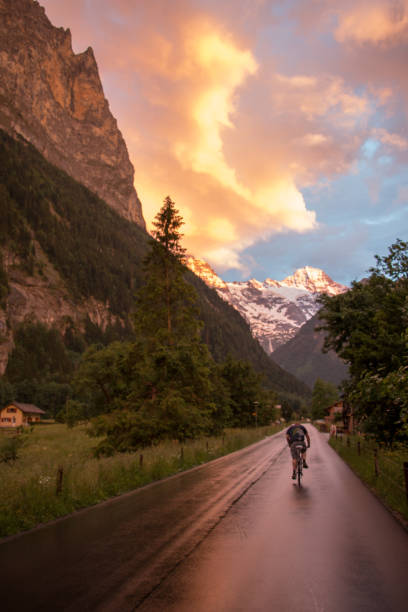 sunrise after a rainstorm of lauterbrunnen waterfall and valley - jungfrau waterfall tree nature imagens e fotografias de stock