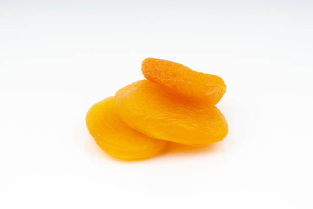 istock Dried apricot isolated on a white background 1169610273