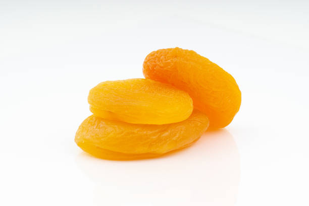 istock Dried apricot isolated on a white background 1169610279