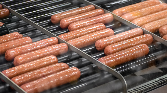 Supermarket grilled sausages for hot dog. NYC, USA.