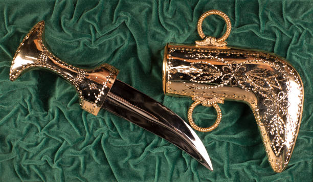 istock golden arabic dagger on a green background 1169613065