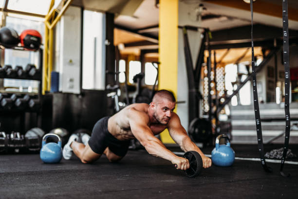 istock Exercising in the gym 1169614074