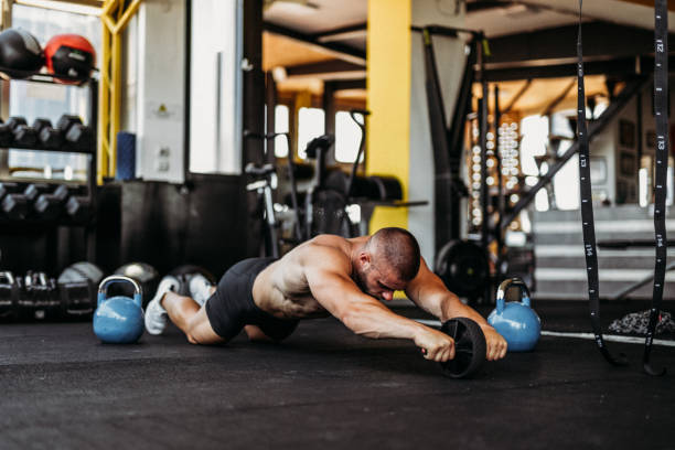 istock Exercising in the gym 1169614275