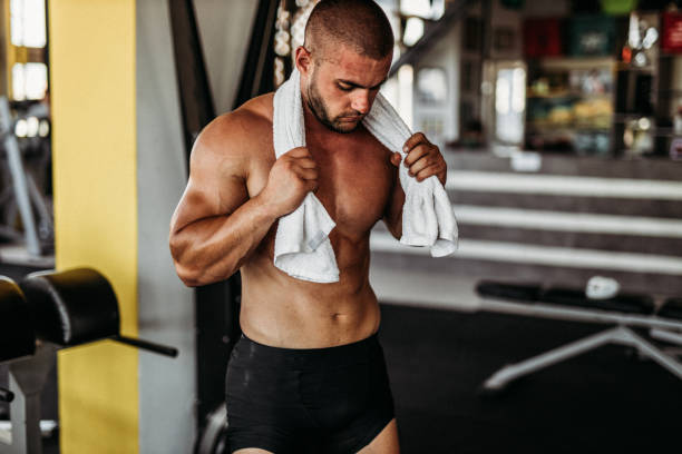 istock Exercising in the gym 1169615128