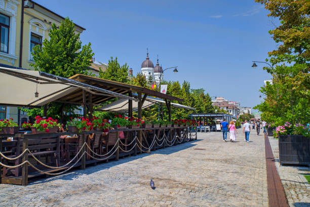 Restaurants and shops on pietonal road IASI, ROMANIA - AUGUST 19, 2019: Pietonal road in Iasi wit restaurants and shops. moldavia photos stock pictures, royalty-free photos & images