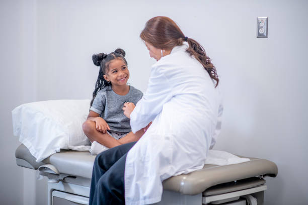 istock Little girl at doctor's office 1169620960