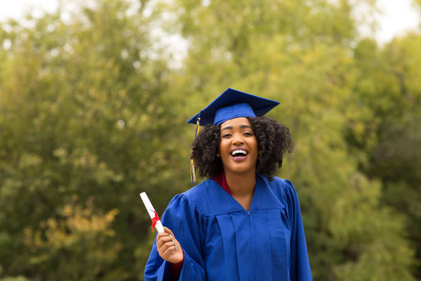 istock Excited young woman on graduation day. 1169622178