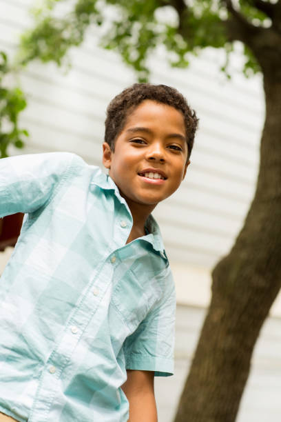 istock Young mixed race little boy playing and smiling. 1169623056