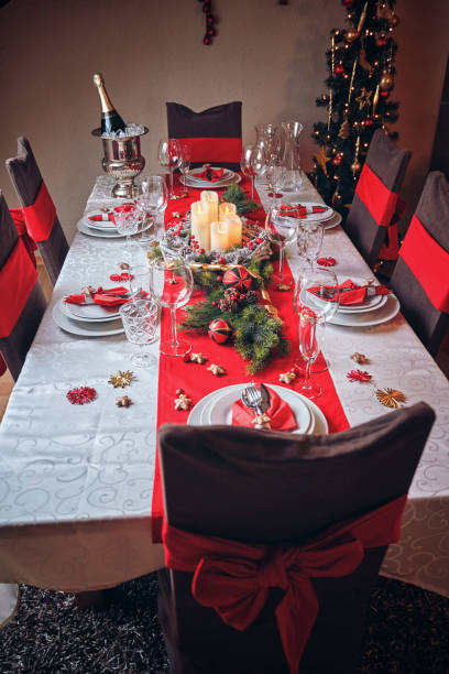 istock Decorated Table for Christmas Dinner with Candles and Christmas Ornaments 1169627528