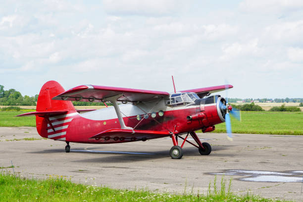 istock historical single engine airplane Antonov AN2, starting the engine 1169627737