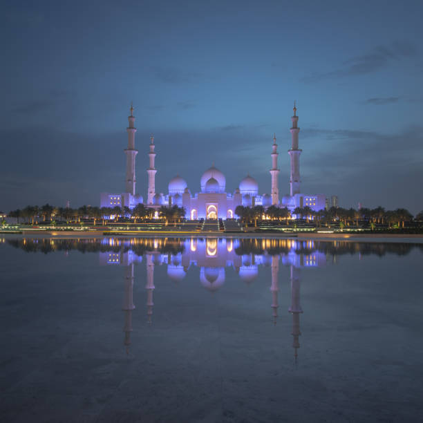istock Axial view of the Great Mosque with reflection, Abu Dhabi, UAE 1169627973