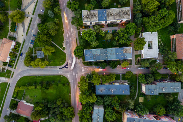 istock Flying over city area 1169629234