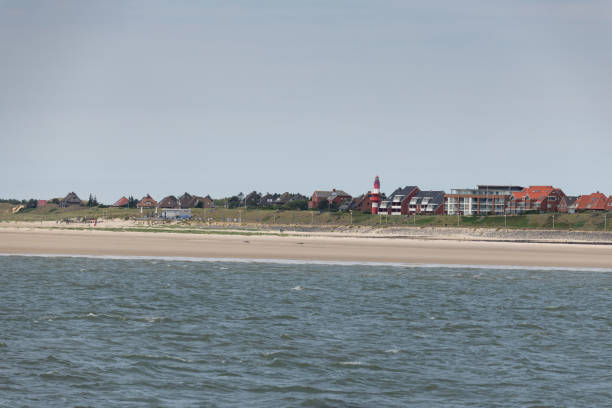 istock Amrum in Germany from ferry at a partly cloudy day 1169629844