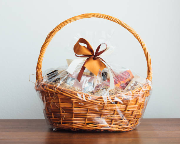 gift basket on gray background gift basket on gray background, close-up view basket stock pictures, royalty-free photos & images