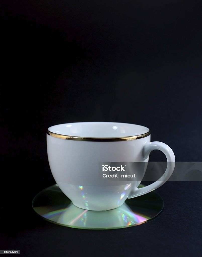 Tasse de café sur un CD coaster - Photo de Dessous de verre libre de droits