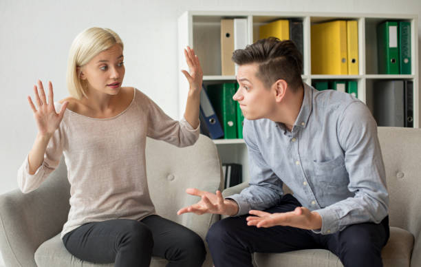 istock Angry husband talking with wife 1169634947