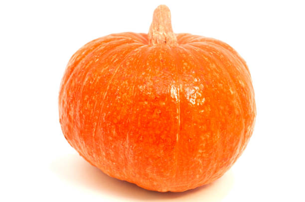 istock Ripe orange pumpkin on a wooden table. 1169634988