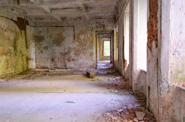 istock abandoned old house with light penetrating through the windows 1169637078