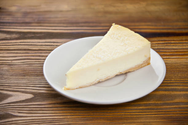istock delicious cheesecake with coconut on  plate 1169637299