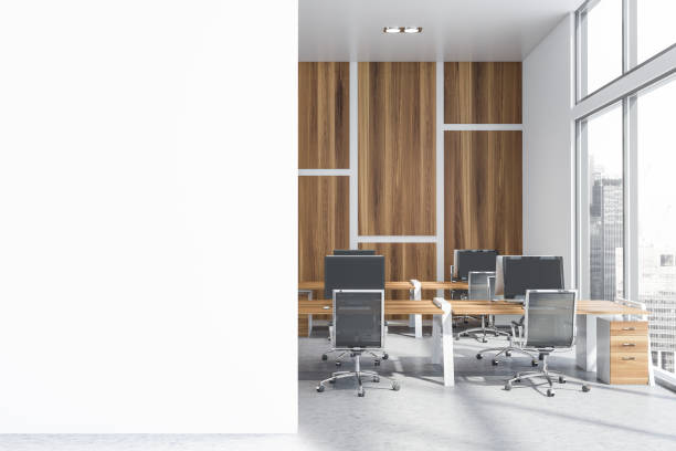 istock Mock up wall in wooden office interior 1169641012