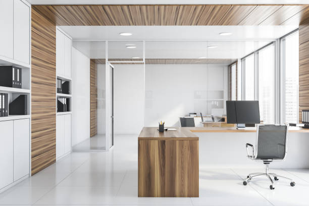 istock White and wood manager office with bookcase 1169642078