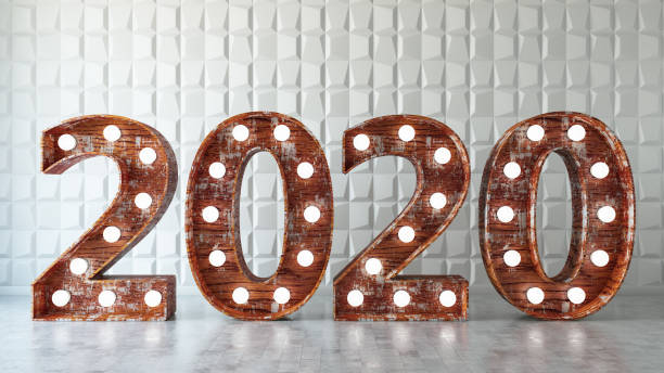 istock 2020 Light Bulb Sign Against White Geometric Wall 1169643986