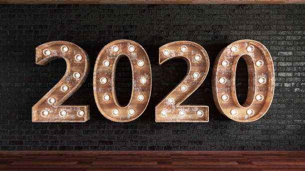 istock 2020 Bulb Sign On Black Brick Wall 1169646921