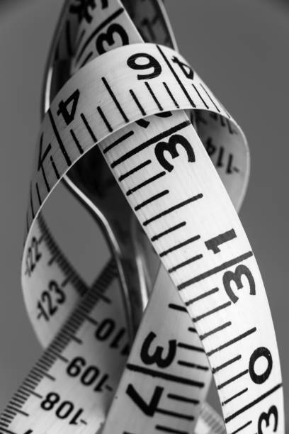 istock Weight Watching, measuring tape 1169648093
