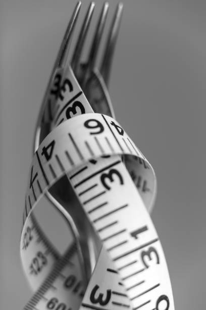 istock Weight Watching, measuring tape 1169648136