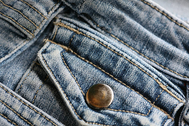 detail shot of a used blue pants stock photo