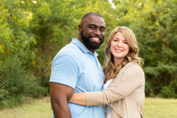 istock Loving mixed race couple hugging. 1169649957