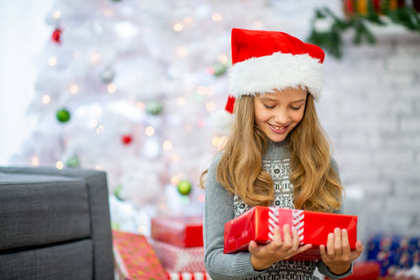 istock Cute Christmas sisters 1169652613