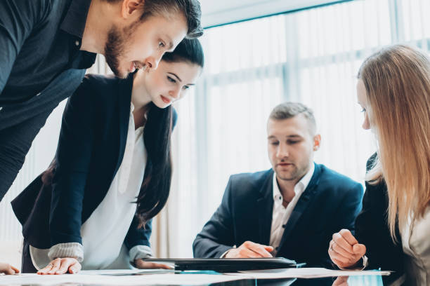 istock team briefing business partners project office 1169655360