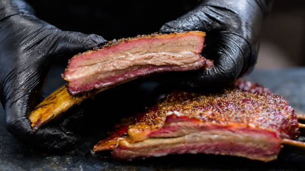 istock culinary master class chef gloves smoked beef ribs 1169655431