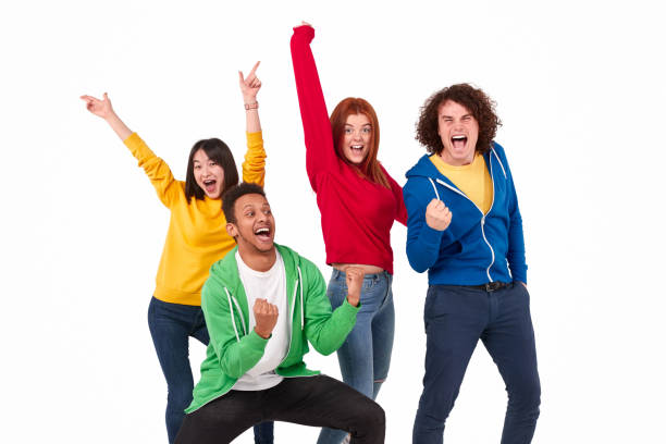 istock Cheerful multiracial winners celebrating success 1169656417
