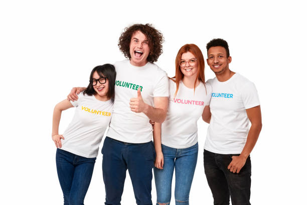 istock Happy multiracial volunteers smiling for camera 1169656430